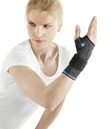 A woman uses a wrist support.